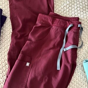 Figs Women's Kade pant in Burgundy. Medium regular.